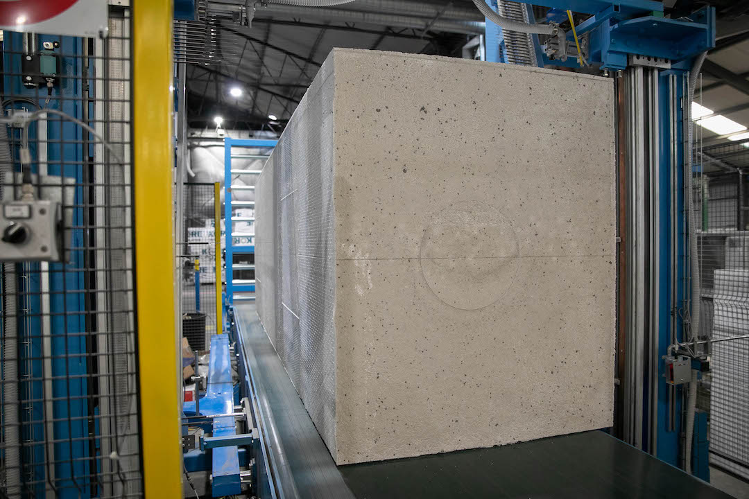 A block of EPS insulation going down the production line for cutting