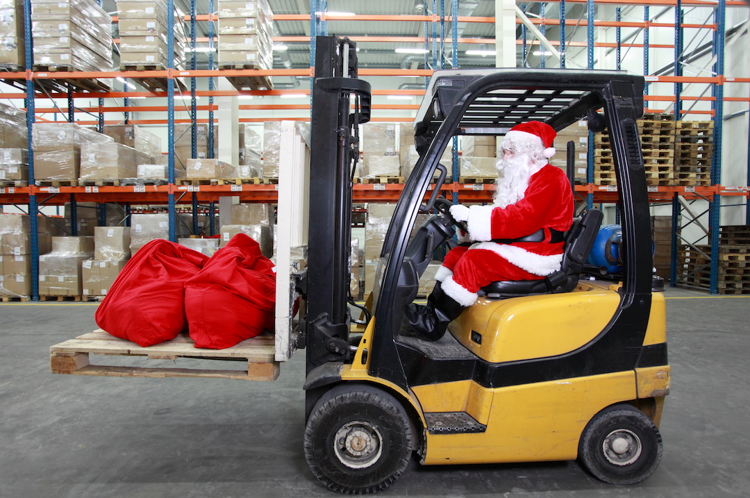KORE Christmas holiday closure notice with Santa driving a forklift